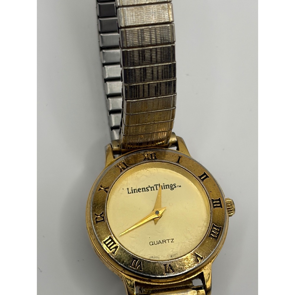 Linens n Things Quartz Gold Tone Stretch‎ Band Watch Roman Numerals